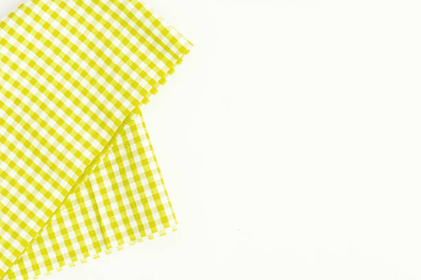 istock Yellow fabric, kitchen towel with checkered pattern, isolated on white background isolated 804365176