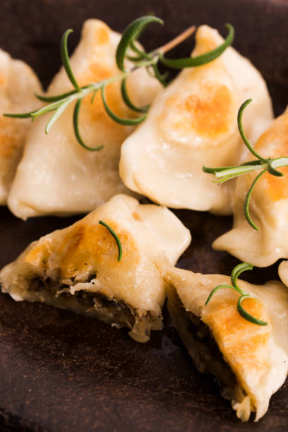 istock Polish pierogi filled with cabbage and mushrooms 804367836