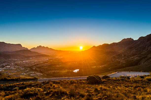 The historic tourist and wine-producing town of Franschhoek in the Western Cape, South Africa, at sunset.