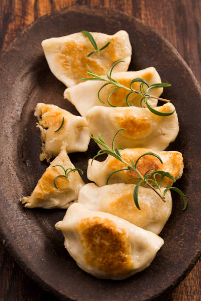 istock Polish pierogi filled with cabbage and mushrooms 804367914