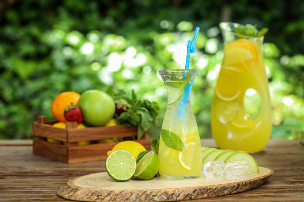 istock Glass of lemon juice with water 804367924