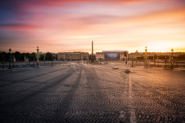 Paris, Place de la Concorde at sunrise The Place de la Concorde is one of the major public squares in Paris, France. It is the largest square in the French Capital. It is located in the city's eighth arrondissement, at the eastern end of the Champs-Élysées. avenue des champs elysees photos stock pictures, royalty-free photos & images