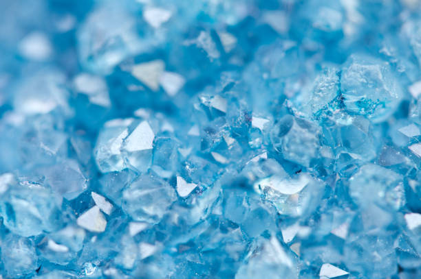 istock Blue crystals Agate mineral its blurred natural background 804369314