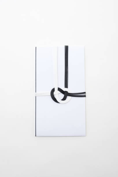 istock A Japanese young lady for wrapping a funeral money 804401292