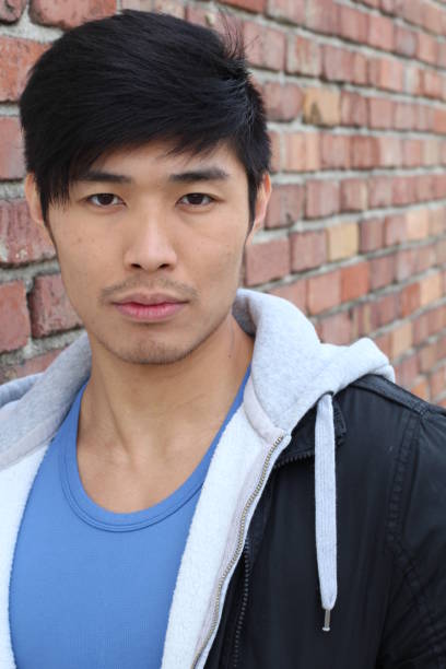 istock Attractive Asian man close up portrait 804416846