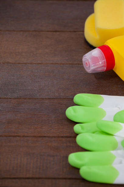 istock Cleaning equipment arranged on wooden floor 804419058