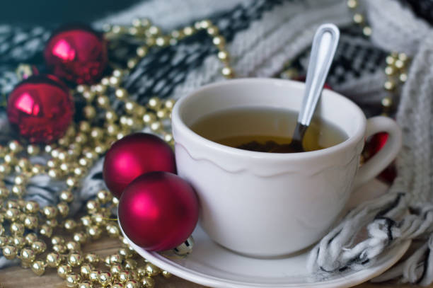 istock Green tea and christmas decoration on wooden table 804419998