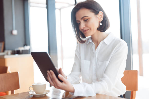 istock Adult woman using tablet 804422604