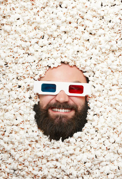 istock Bearded man in stereoglasses and popcorn 804423666
