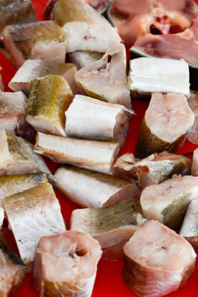 istock Fish hake sliced and chopped and prepared to be baked 804426200