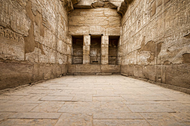 Luxor Egyptian hieroglyphic carvings in a chamber at the temple of Medinat Habu in Luxor pharaonic tomb stock pictures, royalty-free photos & images