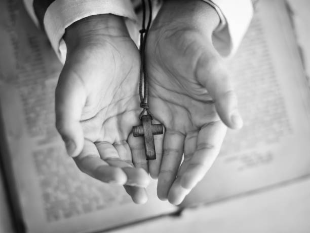 istock Cross in the child's hand 804434978