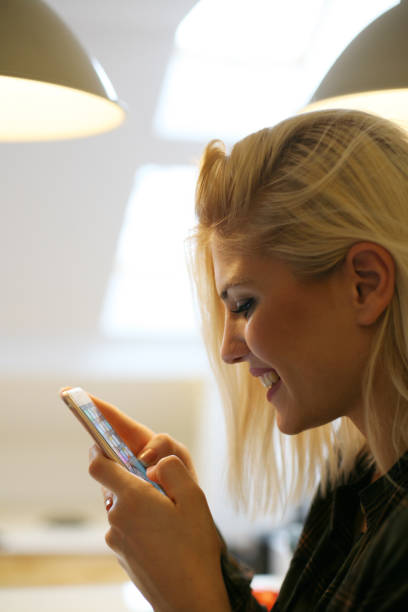 istock Smiling Caucasian woman typing message on smart phone. 804438806