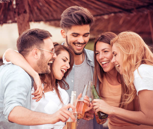 istock Friends having fun on the beach 804439228