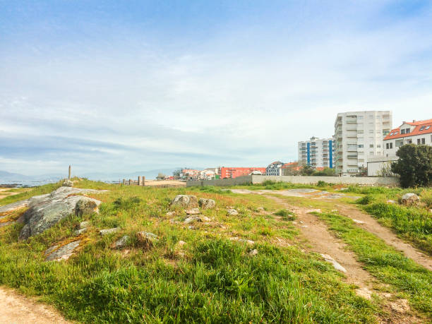 istock Rural road and urban buildings 804444890