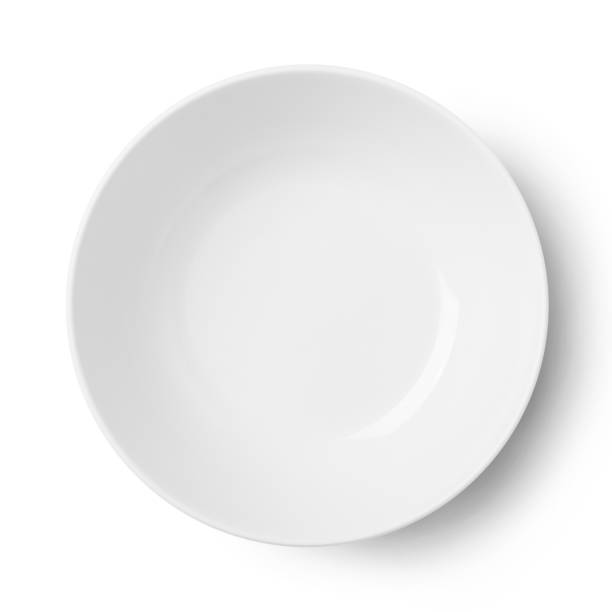 Simple white circular plate Empty plastic round plate isolated on white with clipping path shallow stock pictures, royalty-free photos & images