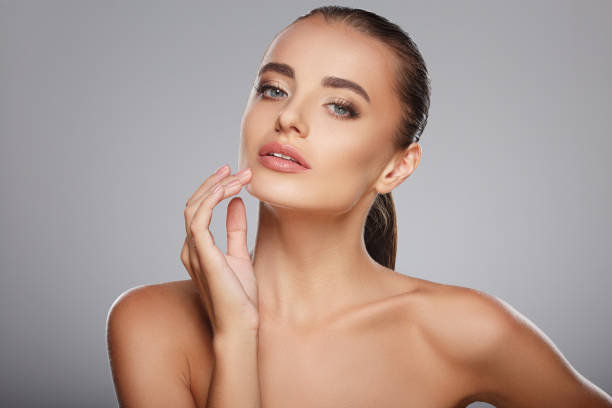 istock Beautiful girl with nude make up at studio 804448286