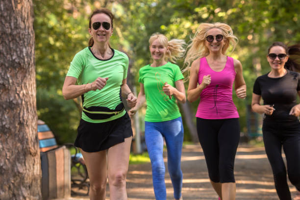 istock Women running in park 804448516