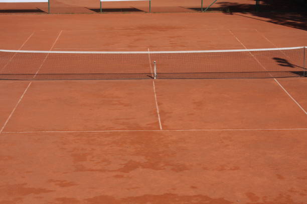 istock Tennis clay court with net 804449608
