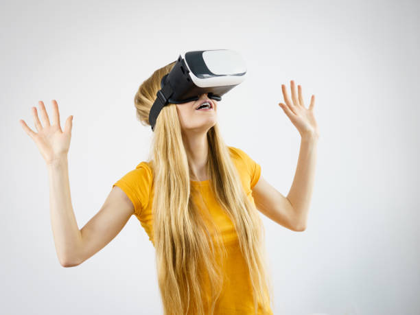 istock Girl wearing virtual reality goggles. 804459270