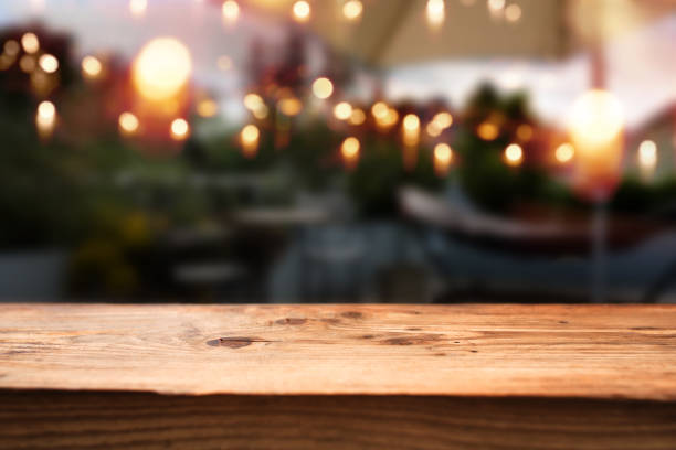 istock Table in front of a night scene 804467866