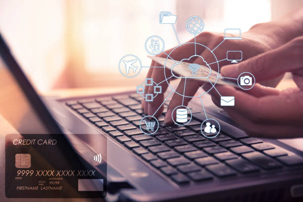 istock Hands holding credit card and using laptop for online shopping. 804487358