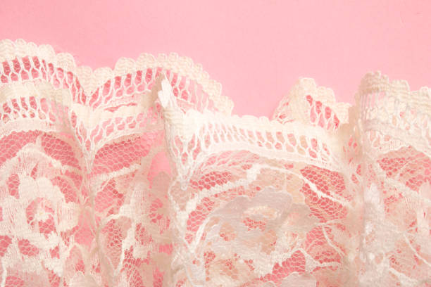 istock White Vintage Lace on Pink Background 804492198