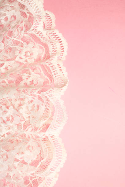 istock White Vintage Lace on Pink Background 804494592
