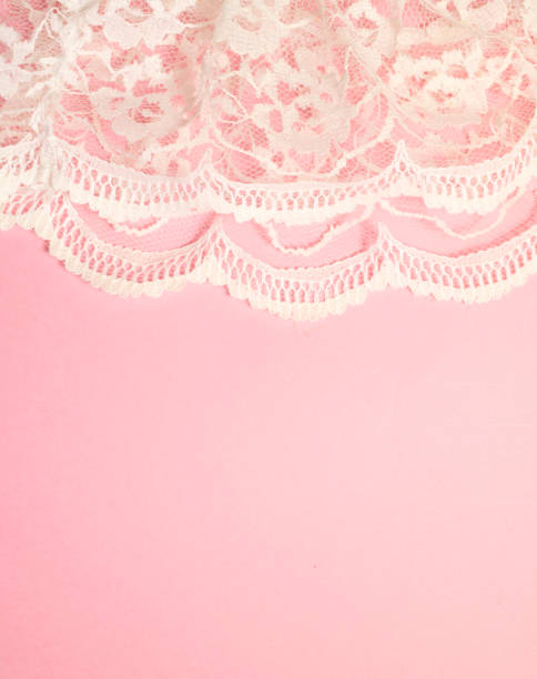 istock White Vintage Lace on Pink Background 804494826