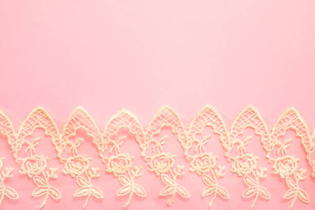 istock White Vintage Lace on Pink Background 804498968
