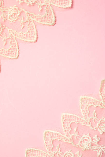 istock White Vintage Lace on Pink Background 804503506