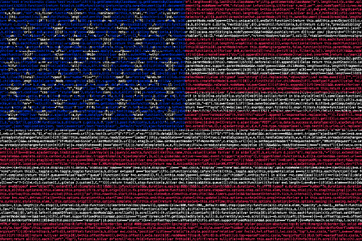 American flag composed of dense computer code cybersecurity programming concept