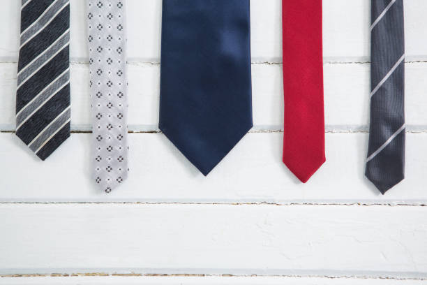 istock Close up of multi colored neckties on table 804507586