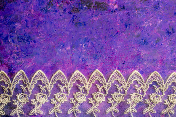 istock White Vintage Lace on Purple Painted Background 804507856
