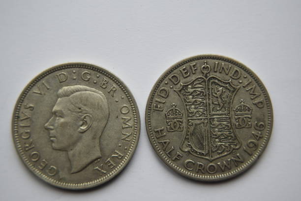 George VI shilling, 1946 Image of both obverse and reverse of a 1938, George VI silver shilling george vi stock pictures, royalty-free photos & images