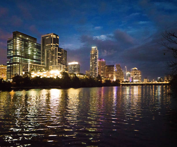 istock Downtown Austin panoramic skyline at night from Colorado River 804524234