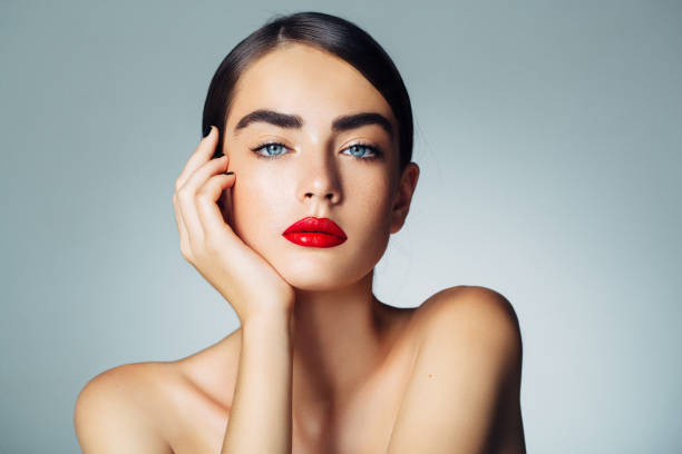 istock Beautiful woman with red lips 804551340