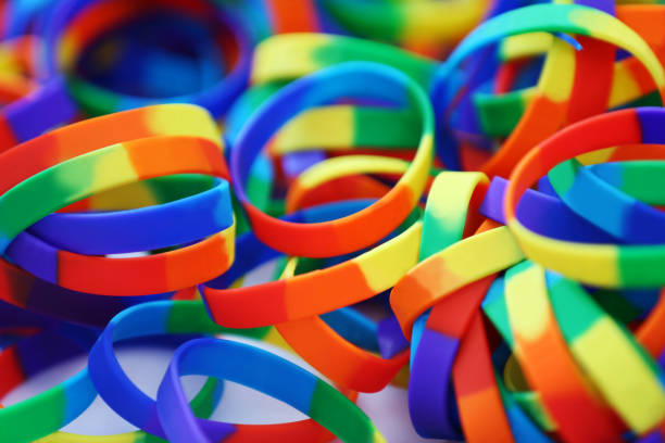 프라이드 퍼레이드 - gay pride wristband rainbow lgbt 뉴스 사진 이미지