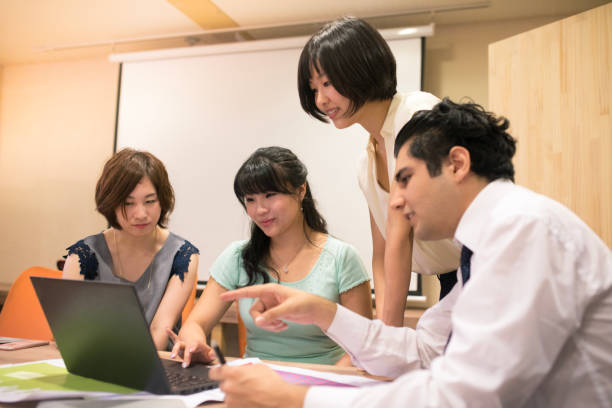 istock Multi-ethnic group of business people having discussion in office 804595580