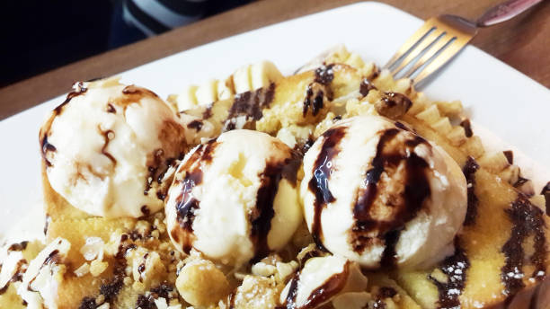 istock Ice cream honey toast on wooden 804600548