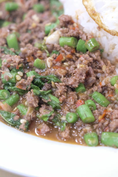 istock Rice topped with stir-fried pork and basil 804619440