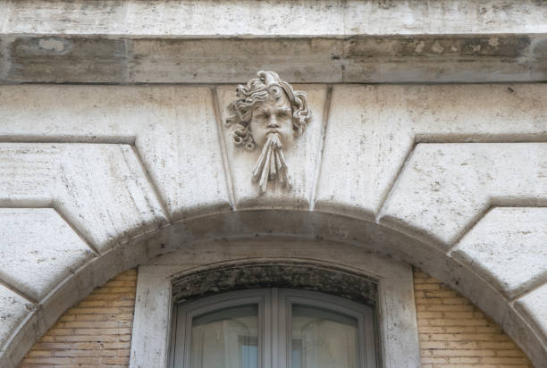sculpture of an angel blowing