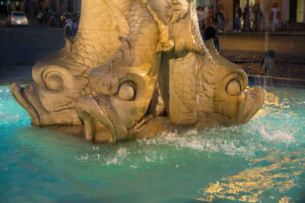istock Triton Fountain at Night, Gian Lorenzo Bernini, Barberini square, Rome 804625110