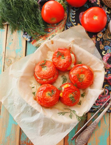 istock Stuffed tomatoes with rice, corn and vegetables. Dietary appetizer 804658634