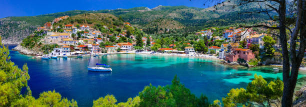 colorful greece series - colorful assos with beautiful bay. kefalonia island - recreational boat small nautical vessel sea imagens e fotografias de stock