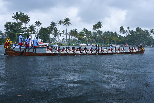Alleppey, India - August 13, 2016 :Unidentified oarsmen/rowers in uniform participating in the very popular Nehru trophy snake boat race on the backwaters in Alappuzha, Kerala, India.