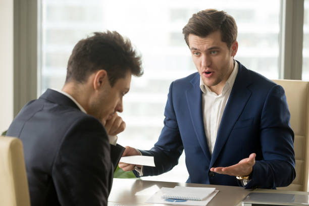 istock Boss yelling at employee for missing deadline, bad work results 804671364