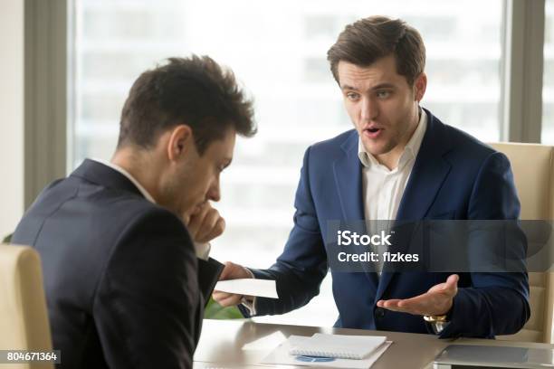 Boss Yelling At Employee For Missing Deadline Bad Work Results Stock Photo - Download Image Now