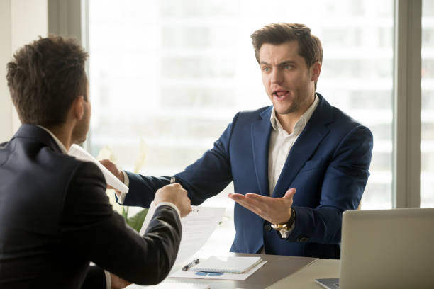 istock Businessmen arguing at workplace, deal failure, breaking contract, unacceptable terms 804671472