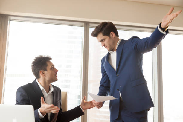 istock Strict boss firing incompetent employee for bad work at workplace 804671580